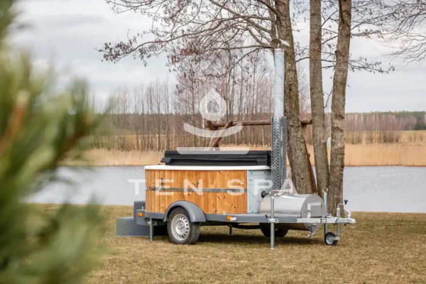 Wooden hot tub integrated in trailer with leather cover